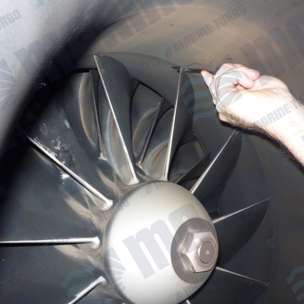 MAN TCA compressor wheel radial clearance check with feeler gauges before disassembly